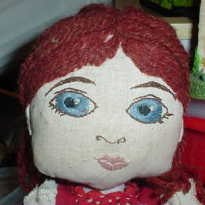 embroidereddollface.jpg